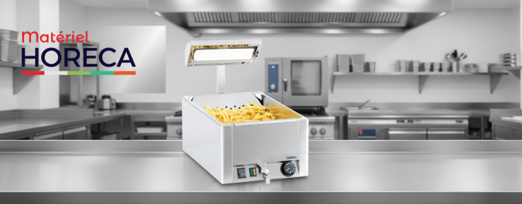 Gros plan photoréaliste d’un chauffe-frites Casselin CCF1 GN 1/1 en inox allumé sur plan professionnel, bac rempli de frites croustillantes.